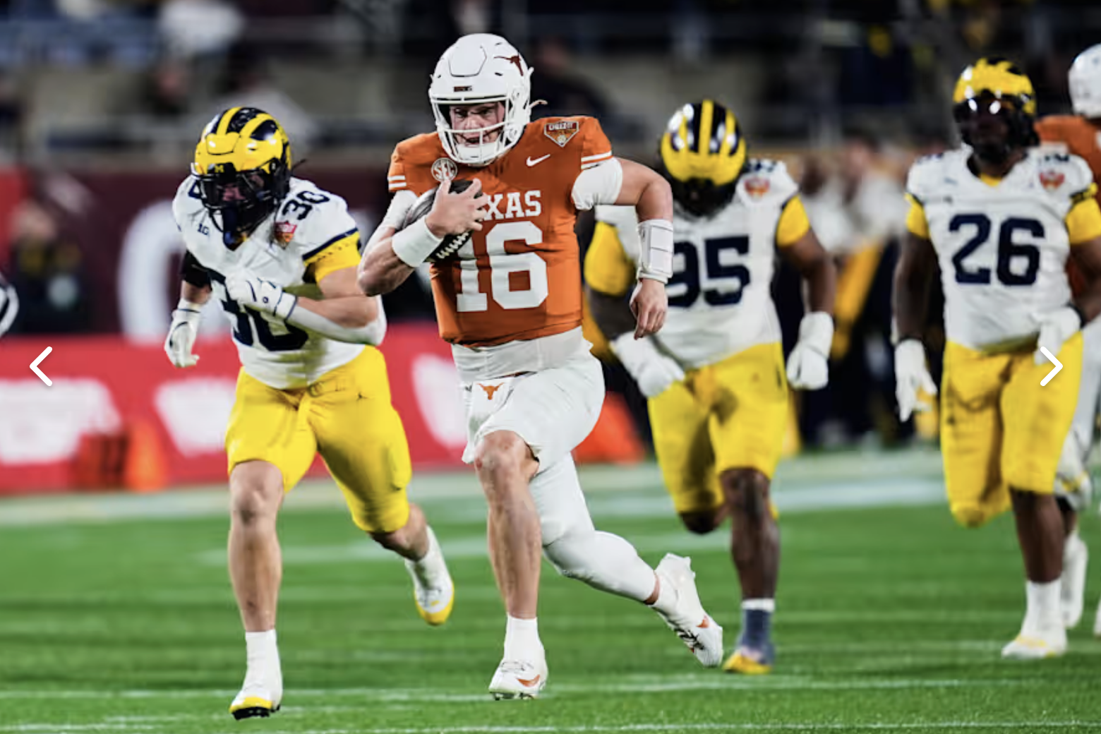 Manning uses arm and legs to lead No. 14 Texas to a 41-27 Citrus Bowl win over No. 18 Michigan